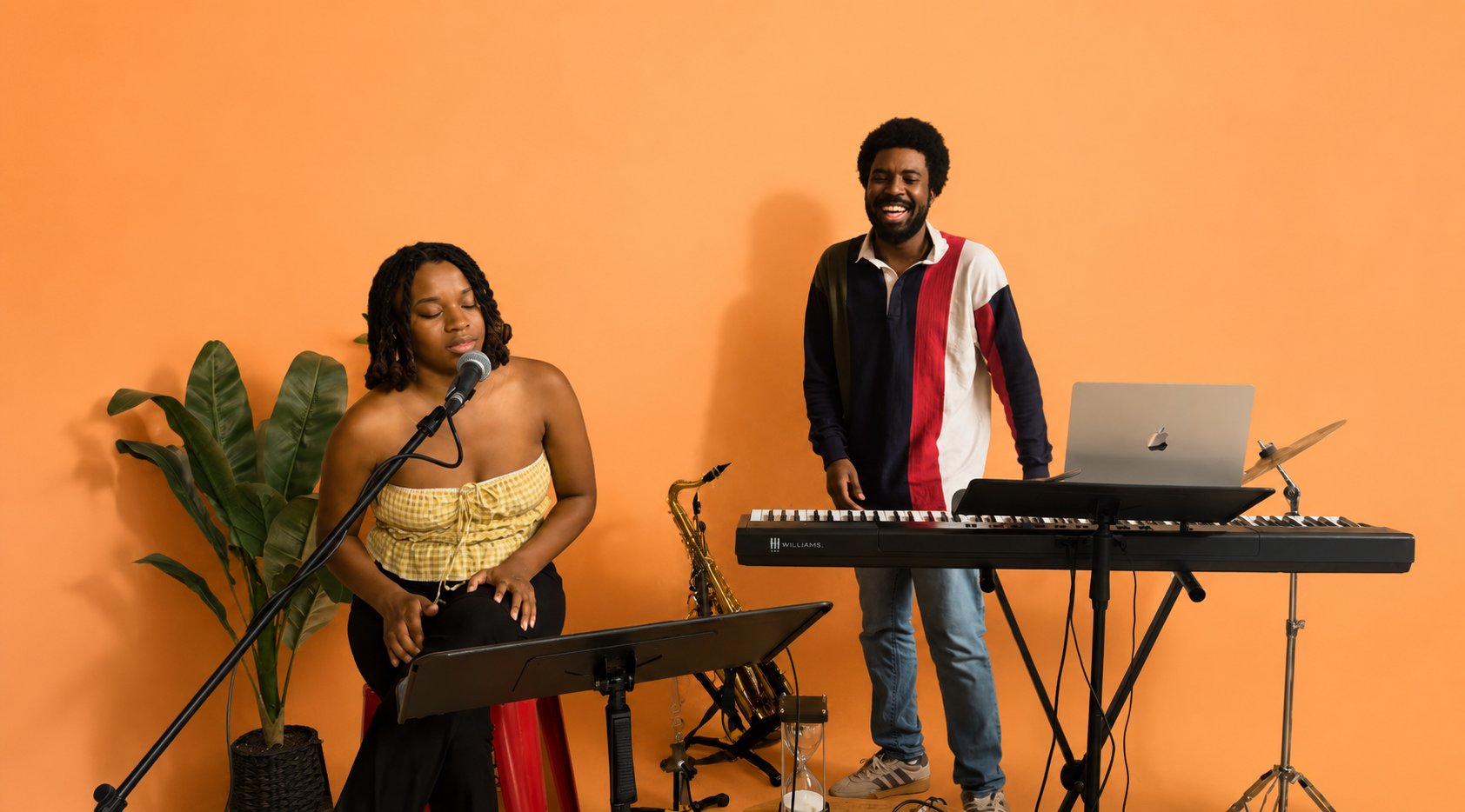 Both members of Kirigami Band with keys and sax